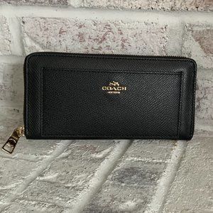 Coach black leather clutch wallet with shiny gold hardware zipper